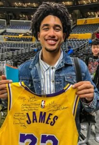 Picture of him with the signed shirt